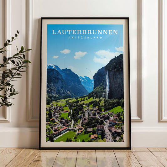A framed poster of the Lauterbrunnen, a famous mountain range in Switzerland, with a scenic view of the valley below.