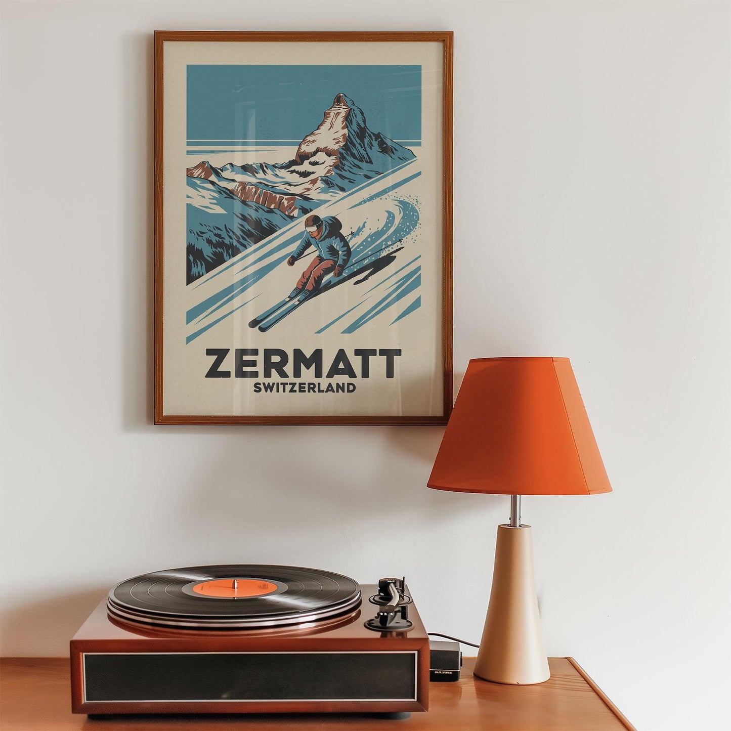 a record player sitting on top of a wooden table