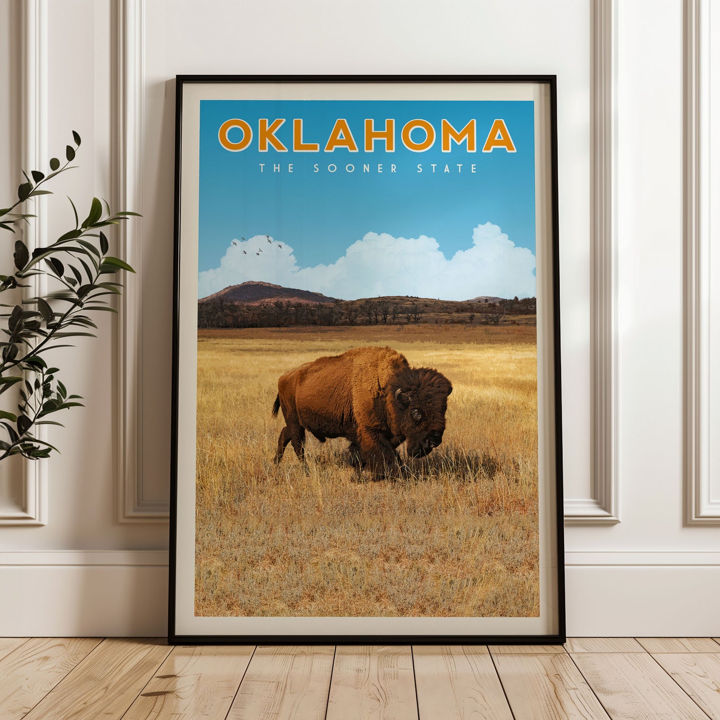 The image is a framed poster of a buffalo in a field, with the text "OKLAHOMA THE SOONER STATE" displayed prominently.