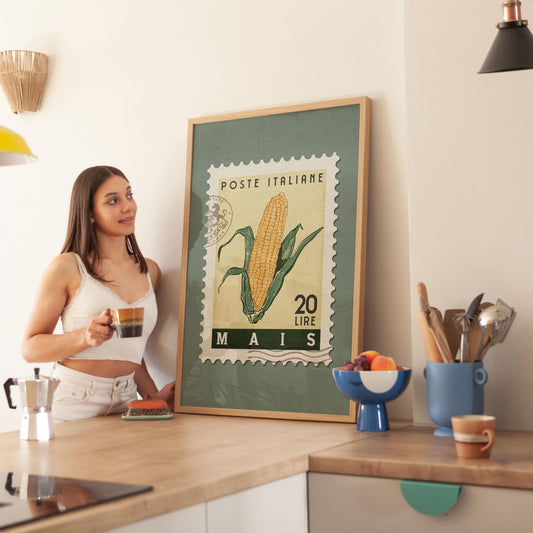 a woman standing in a kitchen next to a poster