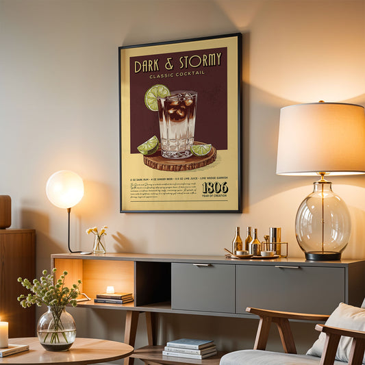 a poster of a cocktail on a wall, with a lamp, a vase of flowers, and a bookshelf below it.