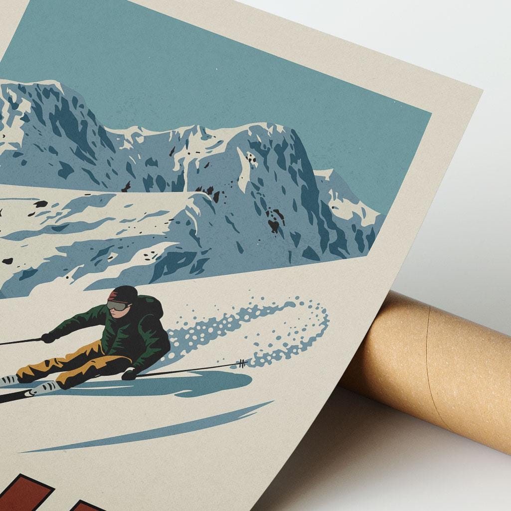 a person riding skis down a snow covered slope