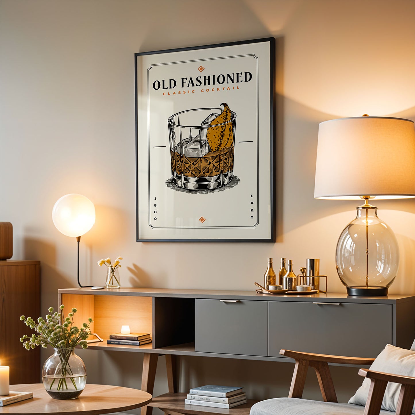 a living room with a framed poster of a cocktail glass on the wall, a wooden sideboard with various items, and a lamp on a table.