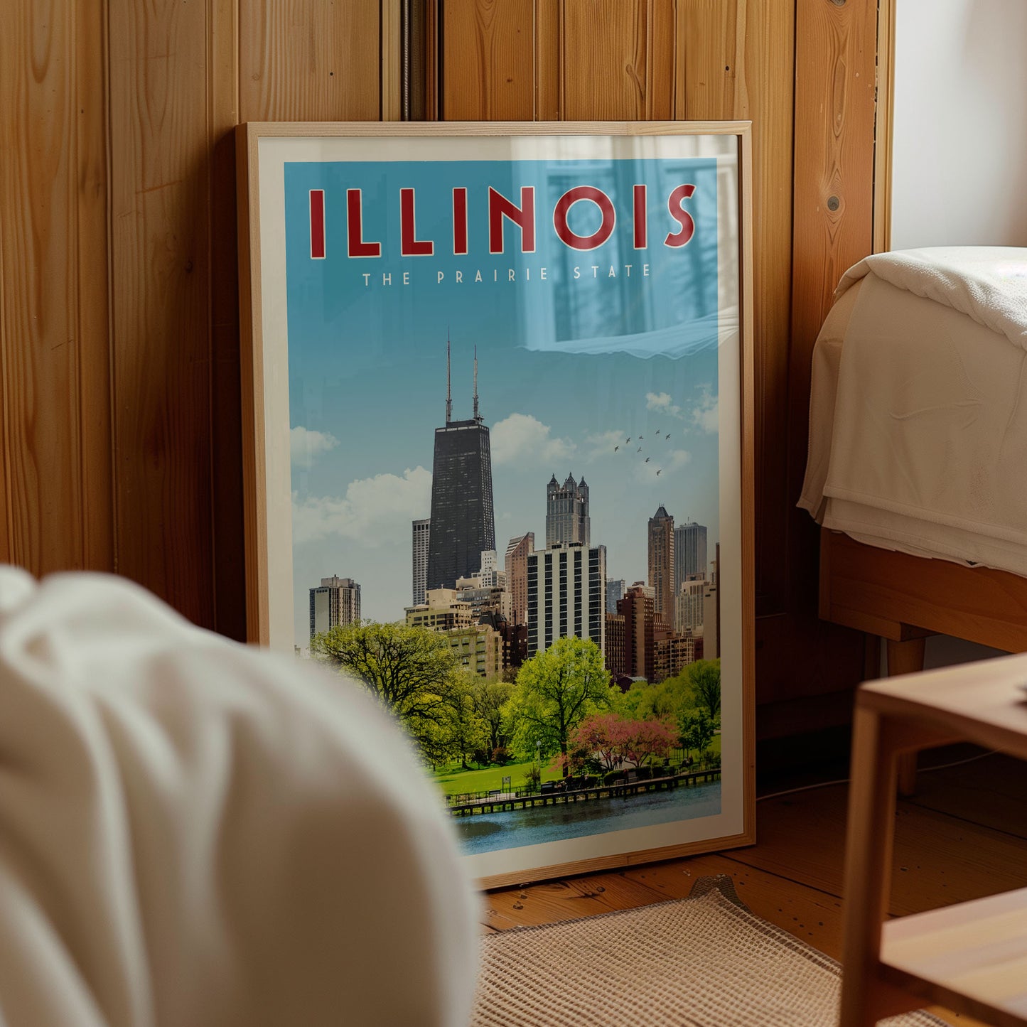 A framed poster of the Chicago skyline, with the text "ILLINOIS THE PRAIRIE STATE" prominently displayed.