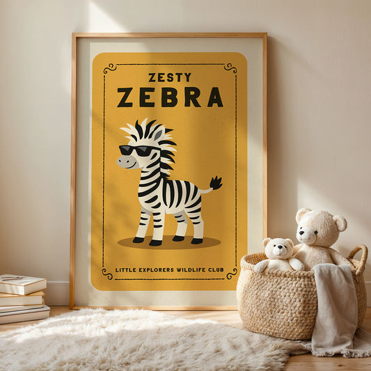 A framed poster of a zebra wearing sunglasses, with the text "ZESTY ZEBRA" and "LITTLE EXPLORERS WILDLIFE CLUB" below it. Next to the poster is a woven basket containing two stuffed animals, and there are some books and a rug on the floor.