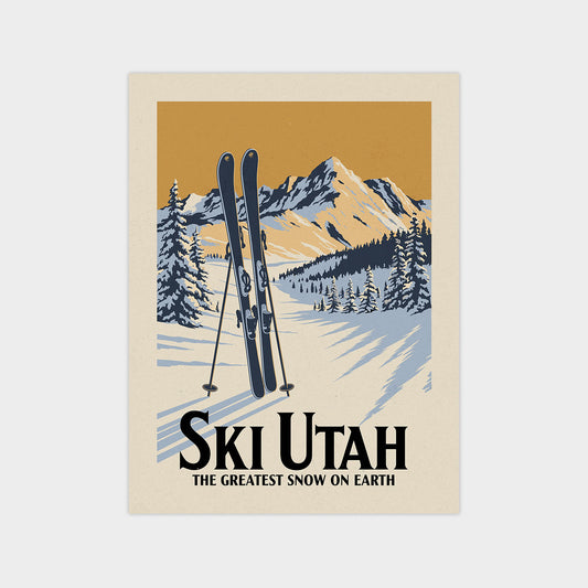 a poster of skis on a snowy mountain