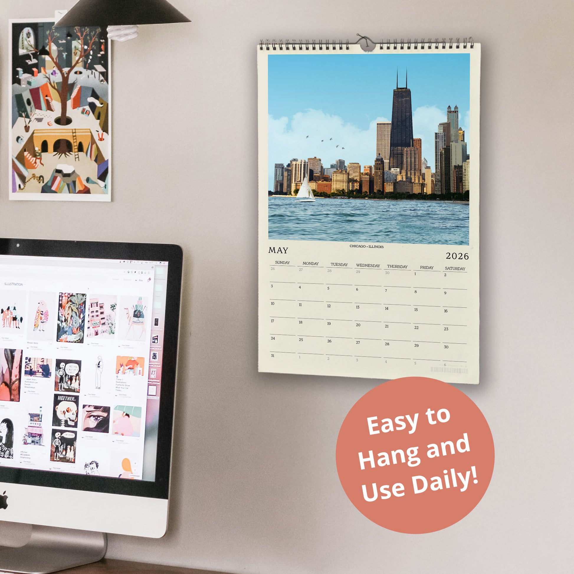 a wall with a calendar and a computer monitor, along with a few other items. The calendar displays a cityscape, and the computer monitor shows a webpage. There is also a text overlay that reads "Easy to Hang and Use Daily!"