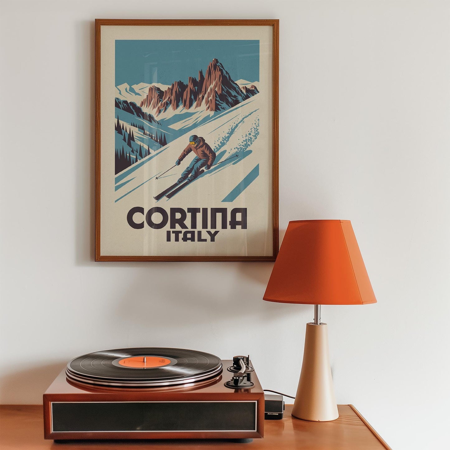 a record player sitting on top of a wooden table