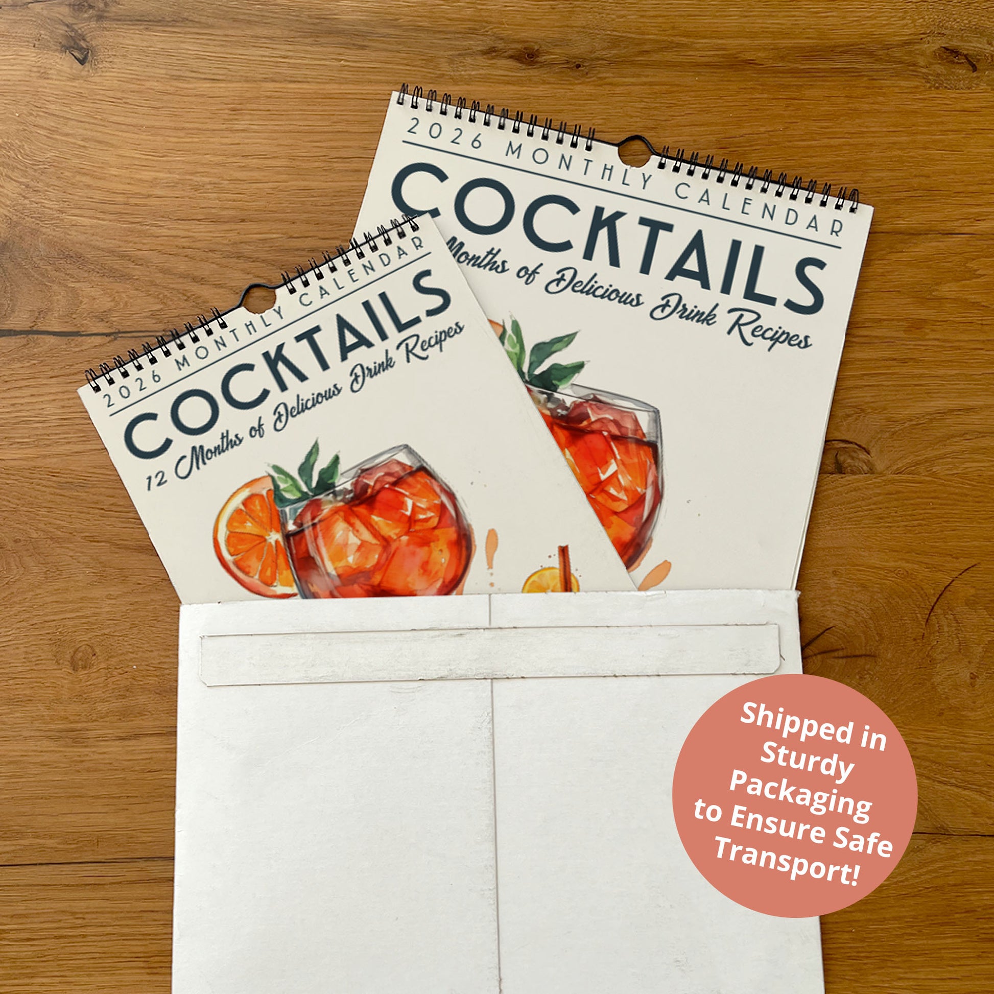 a calendar for cocktails, with a white envelope visible in the foreground.