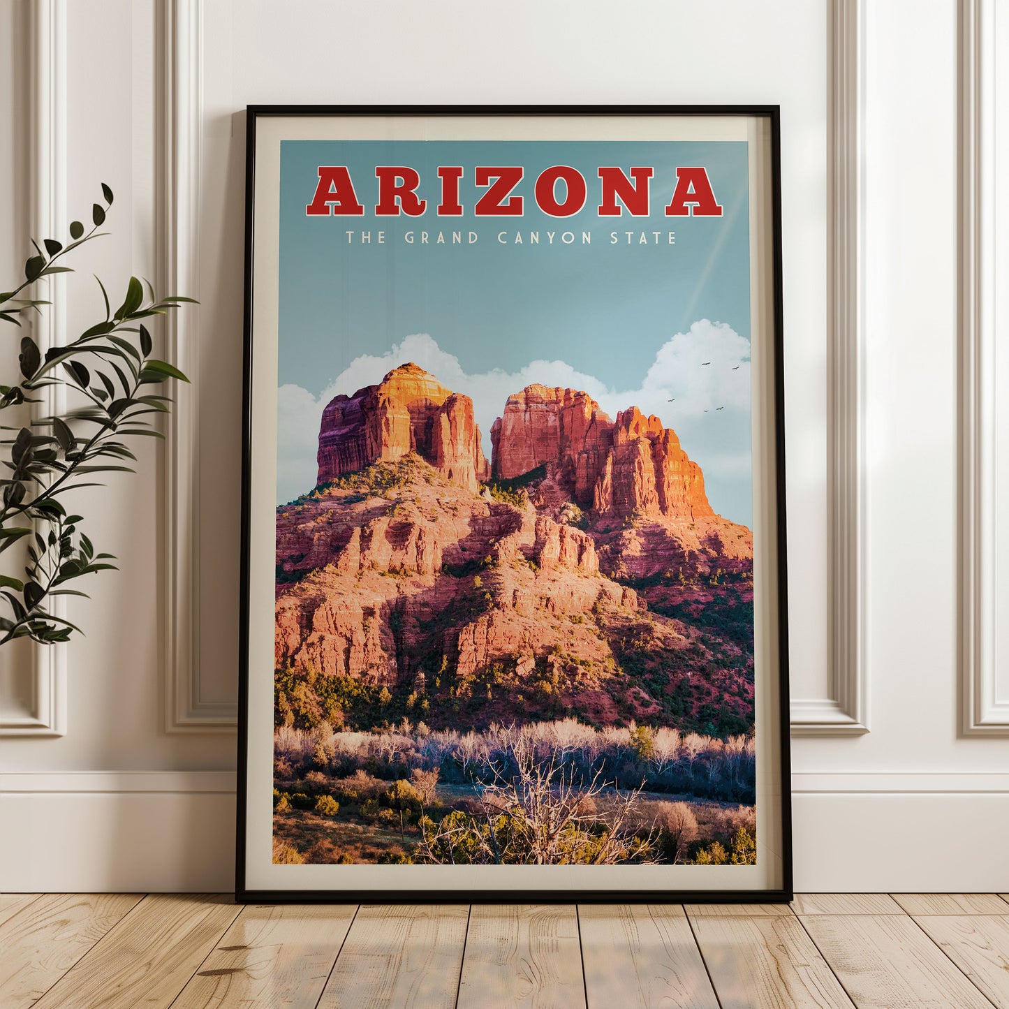 A framed poster of the Grand Canyon State of Arizona, featuring a scenic image of the iconic red rock formations against a blue sky with clouds.