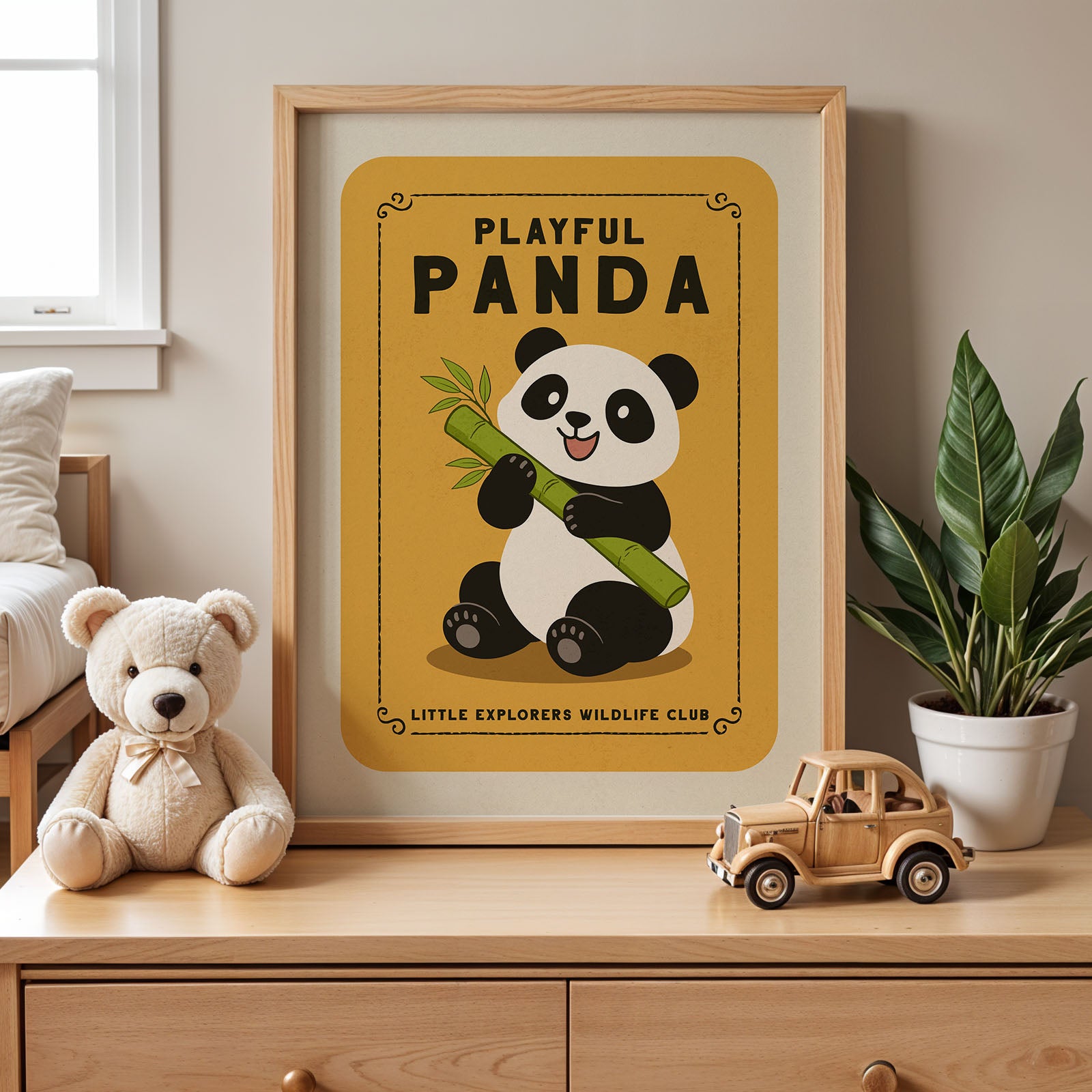 a framed poster of a panda bear holding a bamboo shoot, accompanied by a teddy bear and a toy truck on a wooden dresser.