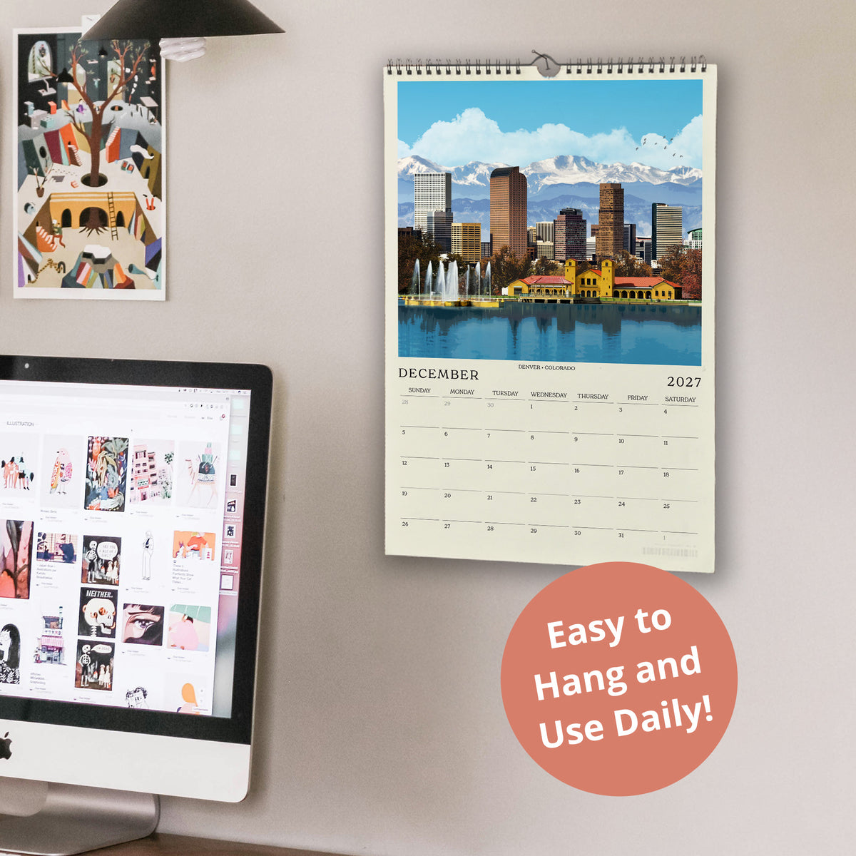 a wall with a calendar for December 2021 hanging on it, along with a computer monitor displaying a webpage. The calendar is easy to hang and use daily.