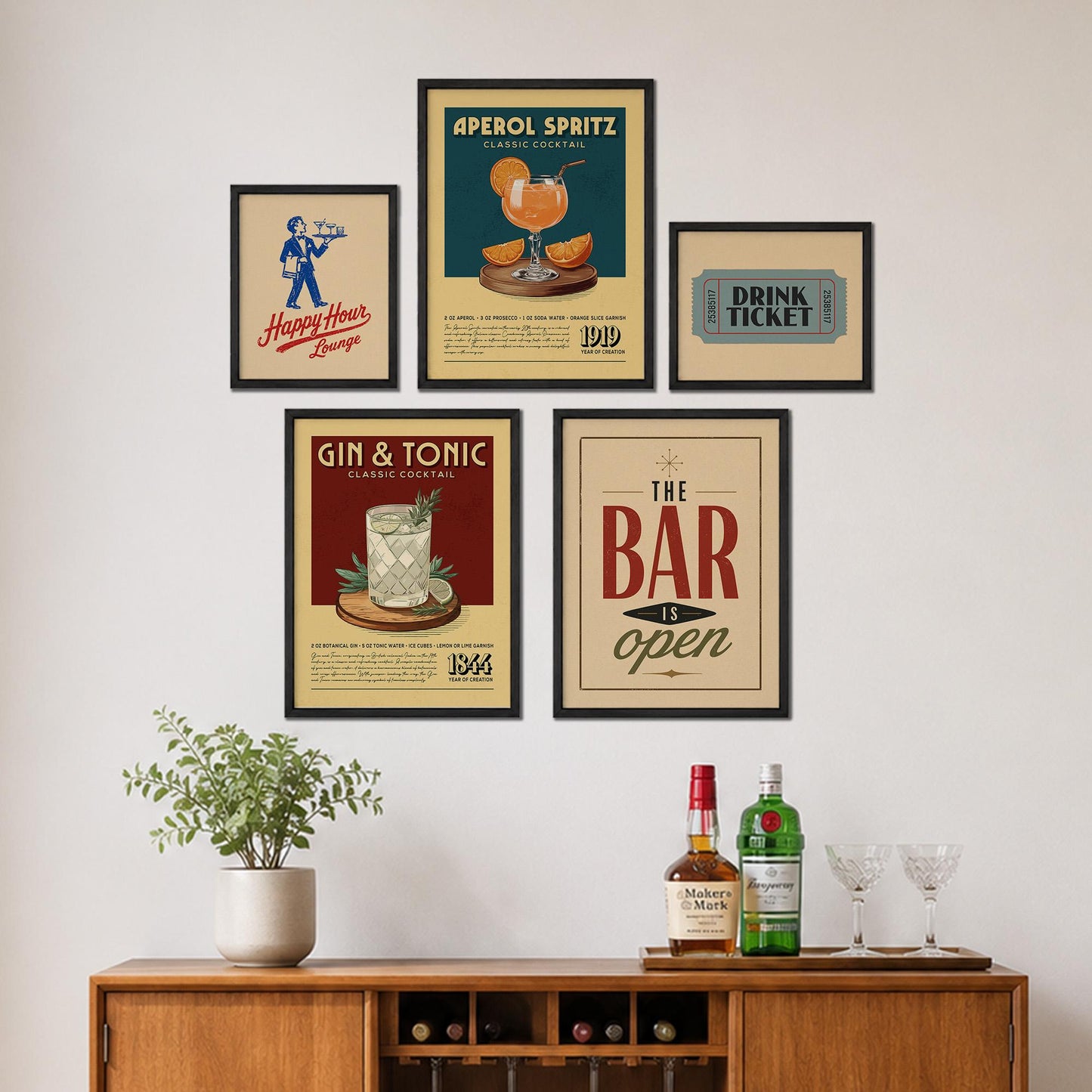 a wall display with framed vintage advertisements for drinks and a bar, along with a wooden cabinet displaying bottles of alcohol and glasses.