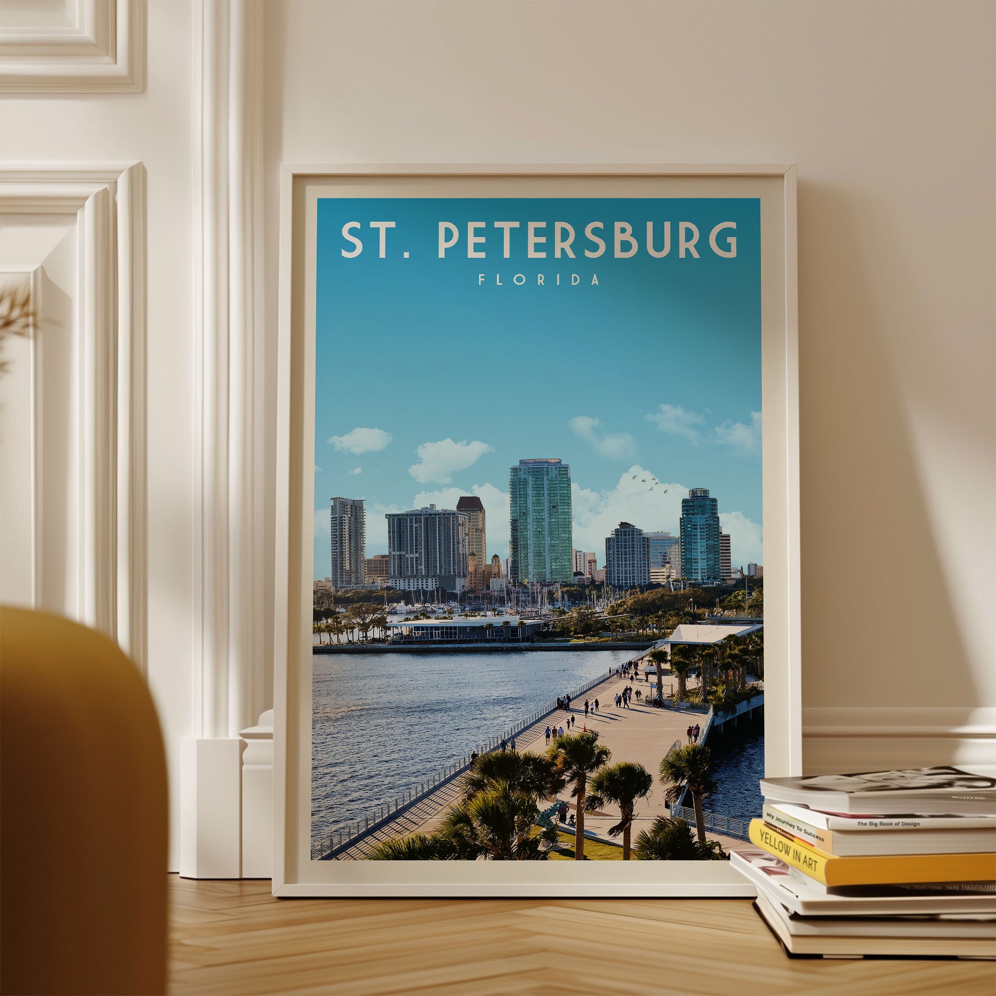 A framed poster of St. Petersburg, Florida, featuring the city's skyline and waterfront.