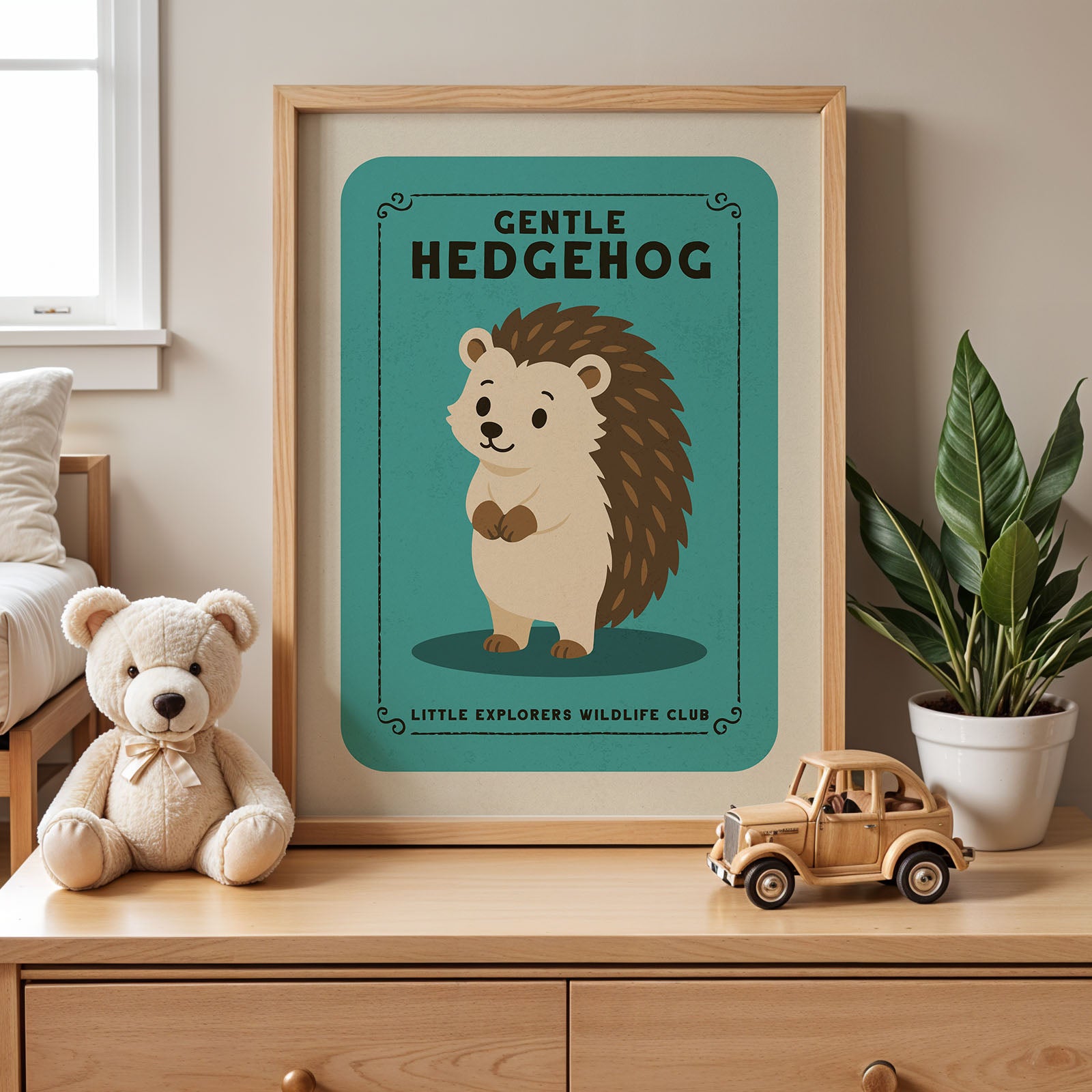 a framed poster of a hedgehog with the text "GENTLE HEDGEHOG" and "LITTLE EXPLORERS WILDLIFE CLUB" below it, along with a teddy bear and a toy truck on a wooden dresser.