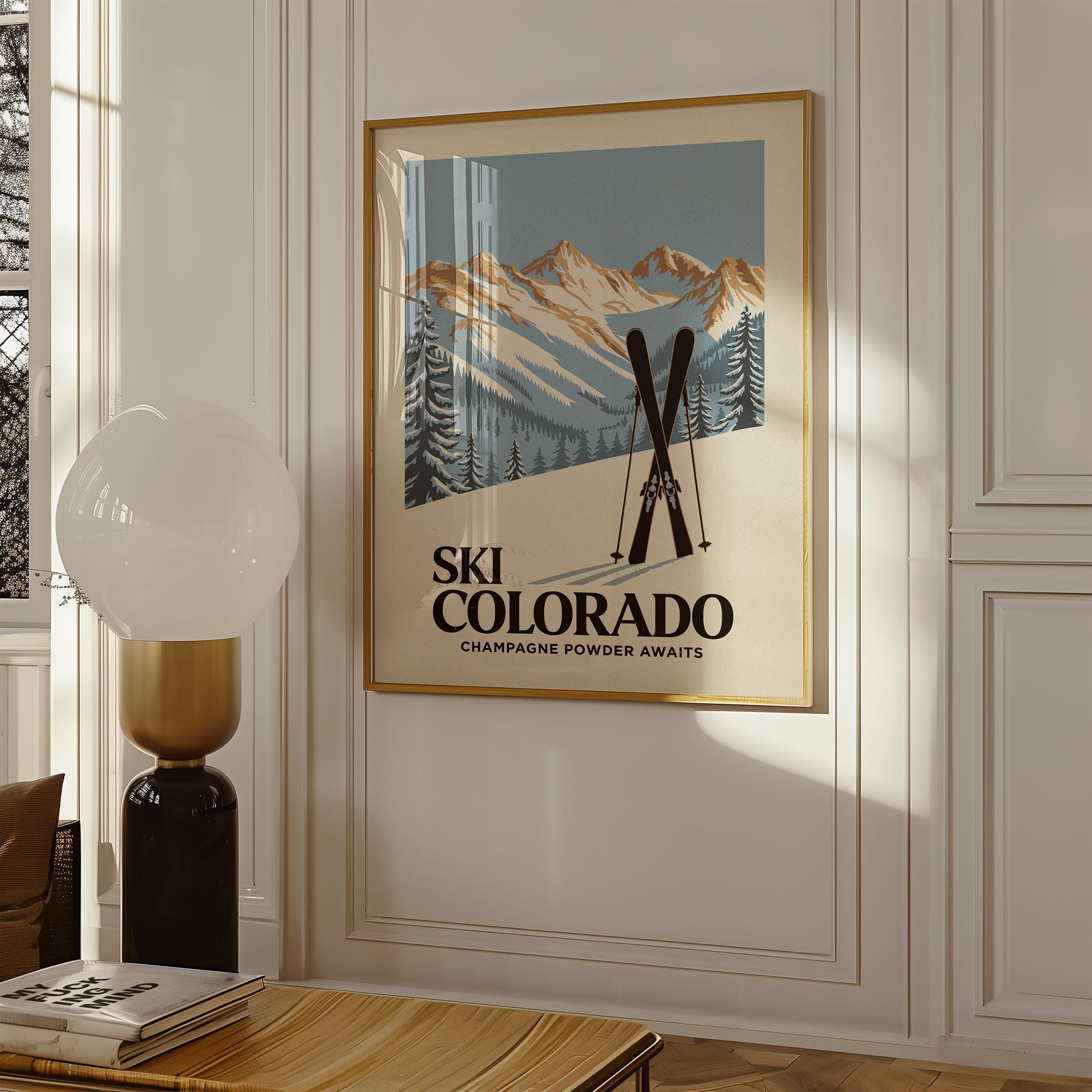 a ski poster hangs on the wall of a living room