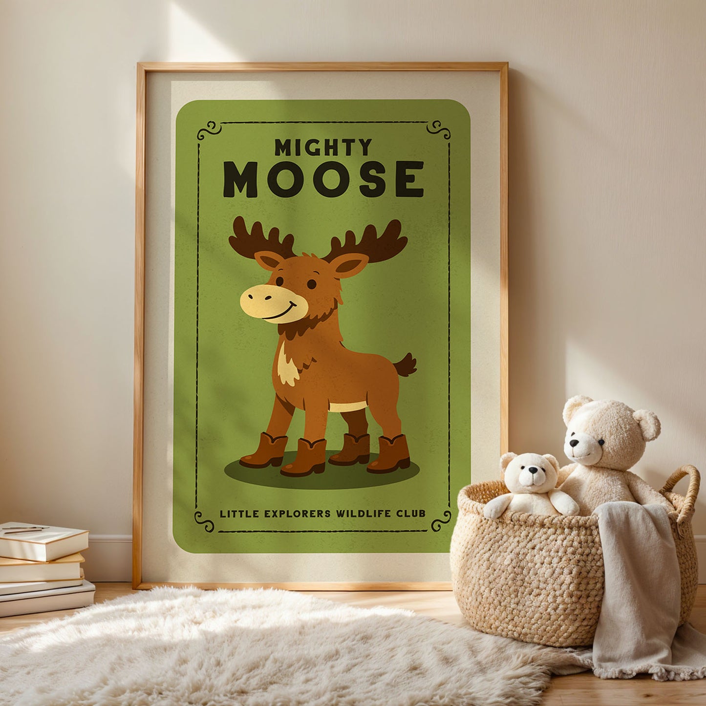 a framed poster of a cartoon moose, with a basket of stuffed animals next to it.
