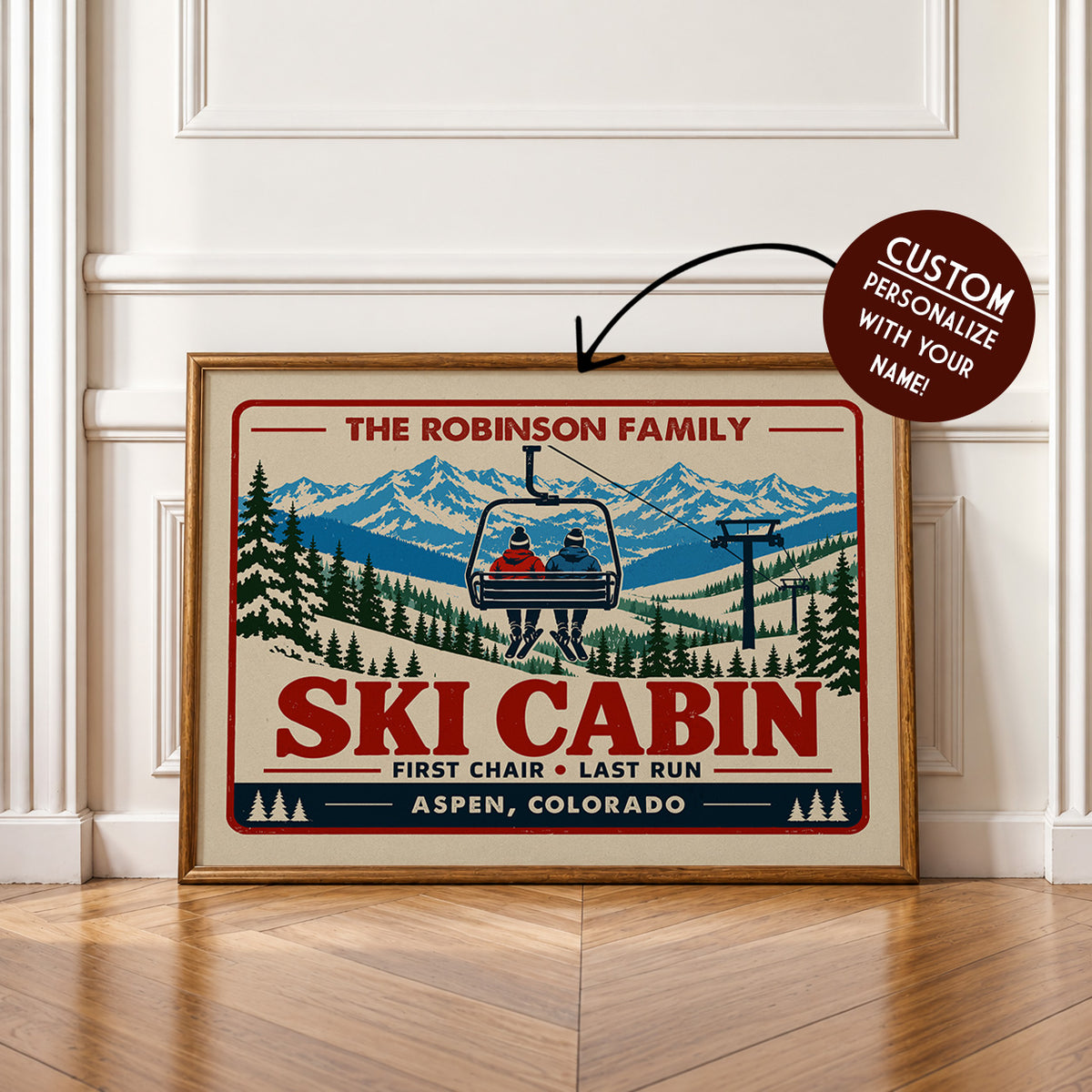 The image is a framed poster depicting a ski cabin with a ski lift, set against a snowy mountain landscape.