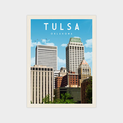 a cityscape of Oklahoma, with a mix of modern and older buildings under a blue sky.