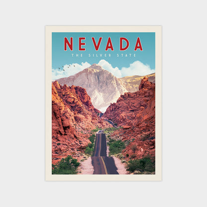 a scenic road winding through a mountainous landscape, with a clear blue sky and a large mountain in the background.