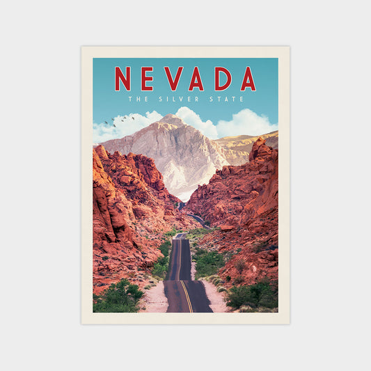 a scenic road winding through a mountainous landscape, with a clear blue sky and a large mountain in the background.
