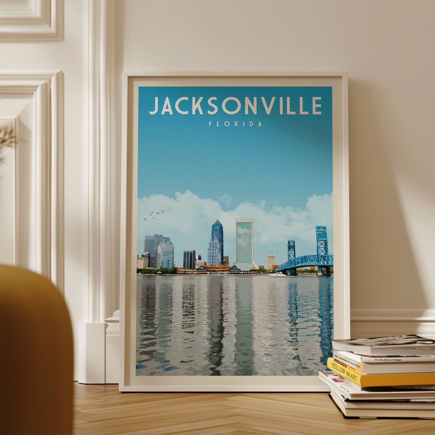 A framed poster of the skyline of Jacksonville, Florida, with a body of water in the foreground.