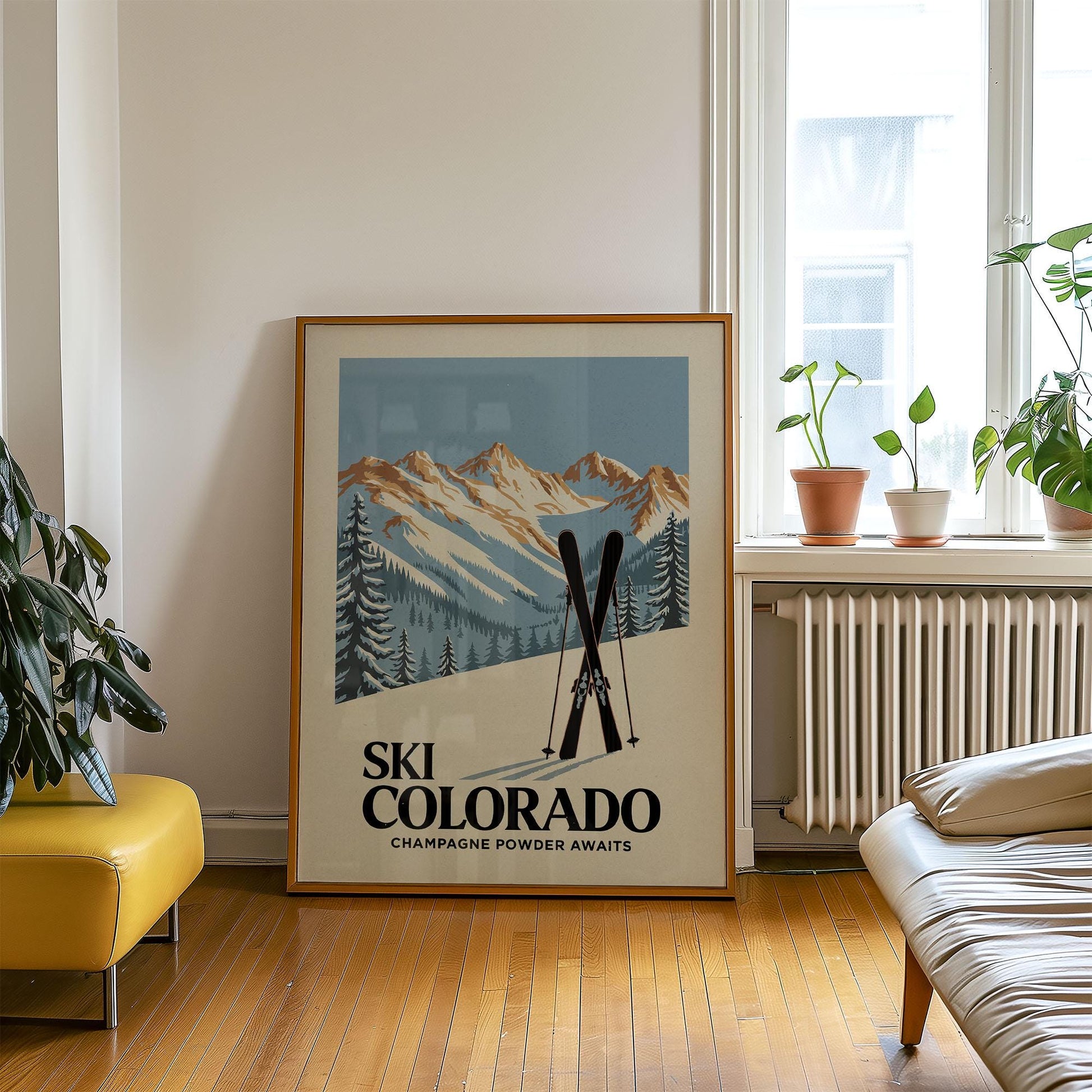 a ski poster hangs on the wall of a living room