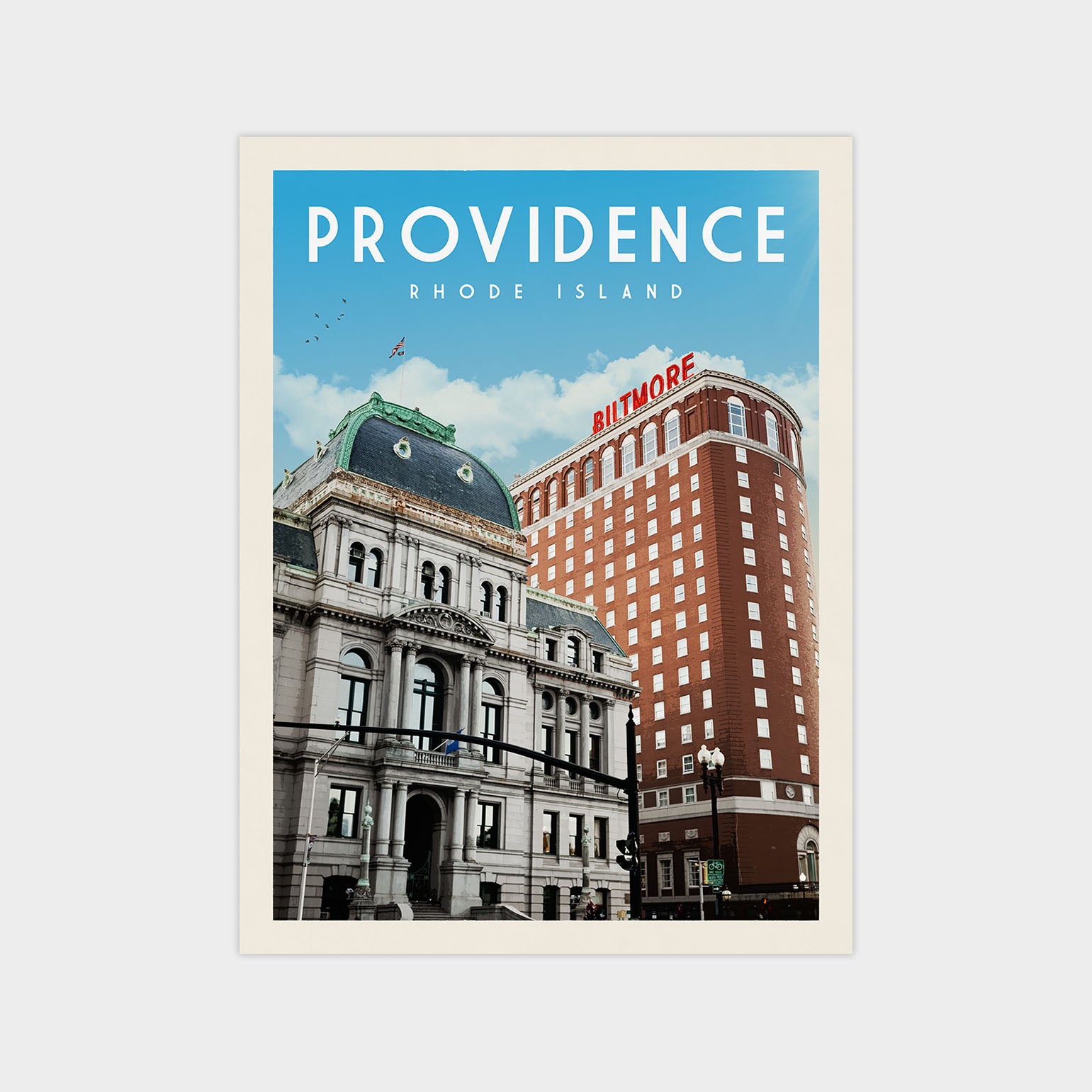 a cityscape with a large, ornate building and a modern, red-brick building, both located in Rhode Island.