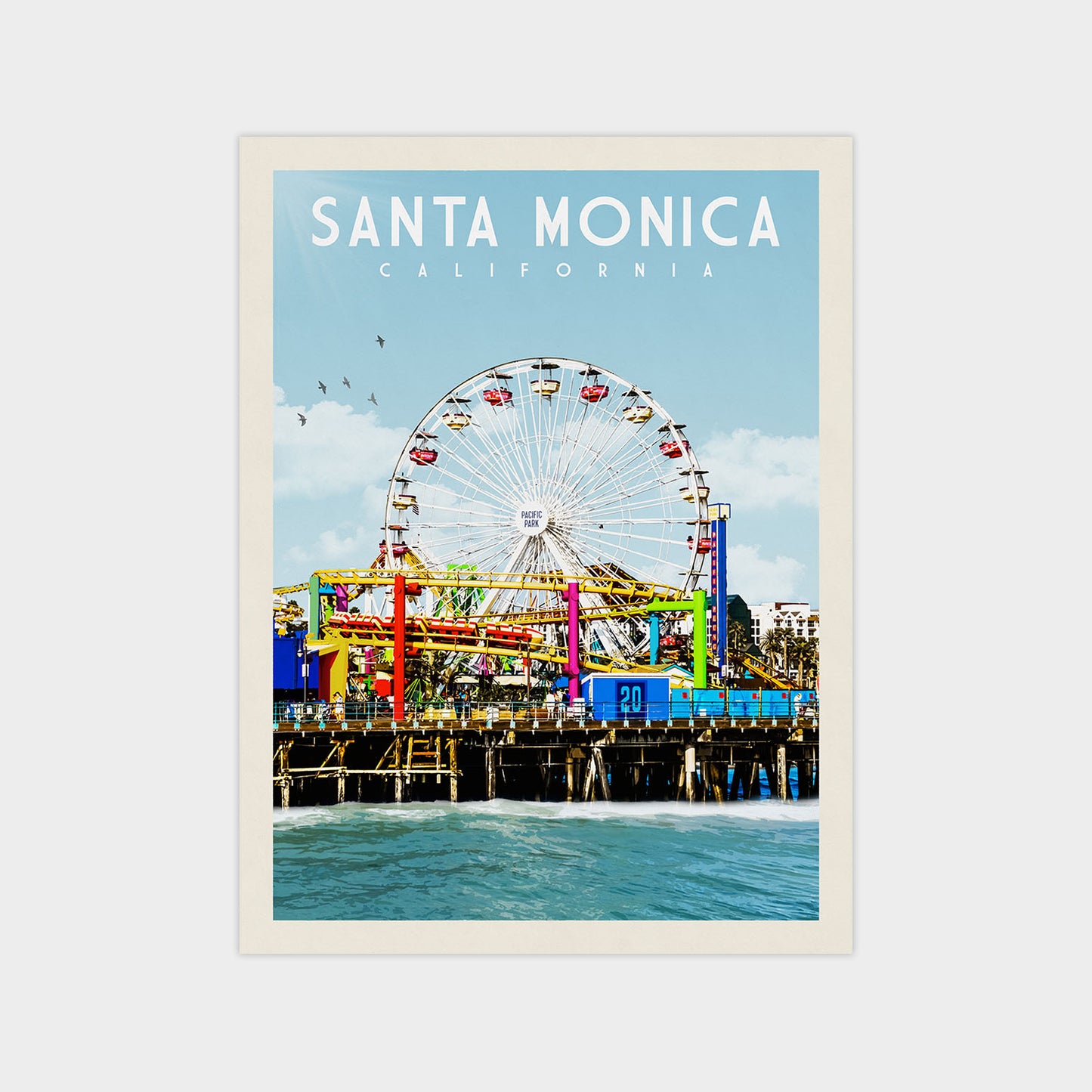 A colorful ferris wheel stands tall against a clear blue sky, with a body of water in the foreground.