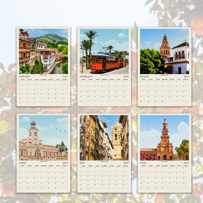 The image is a calendar featuring six different pictures of various landmarks and buildings, including a castle, a trolley, and a church, set against a backdrop of trees and a clear sky.