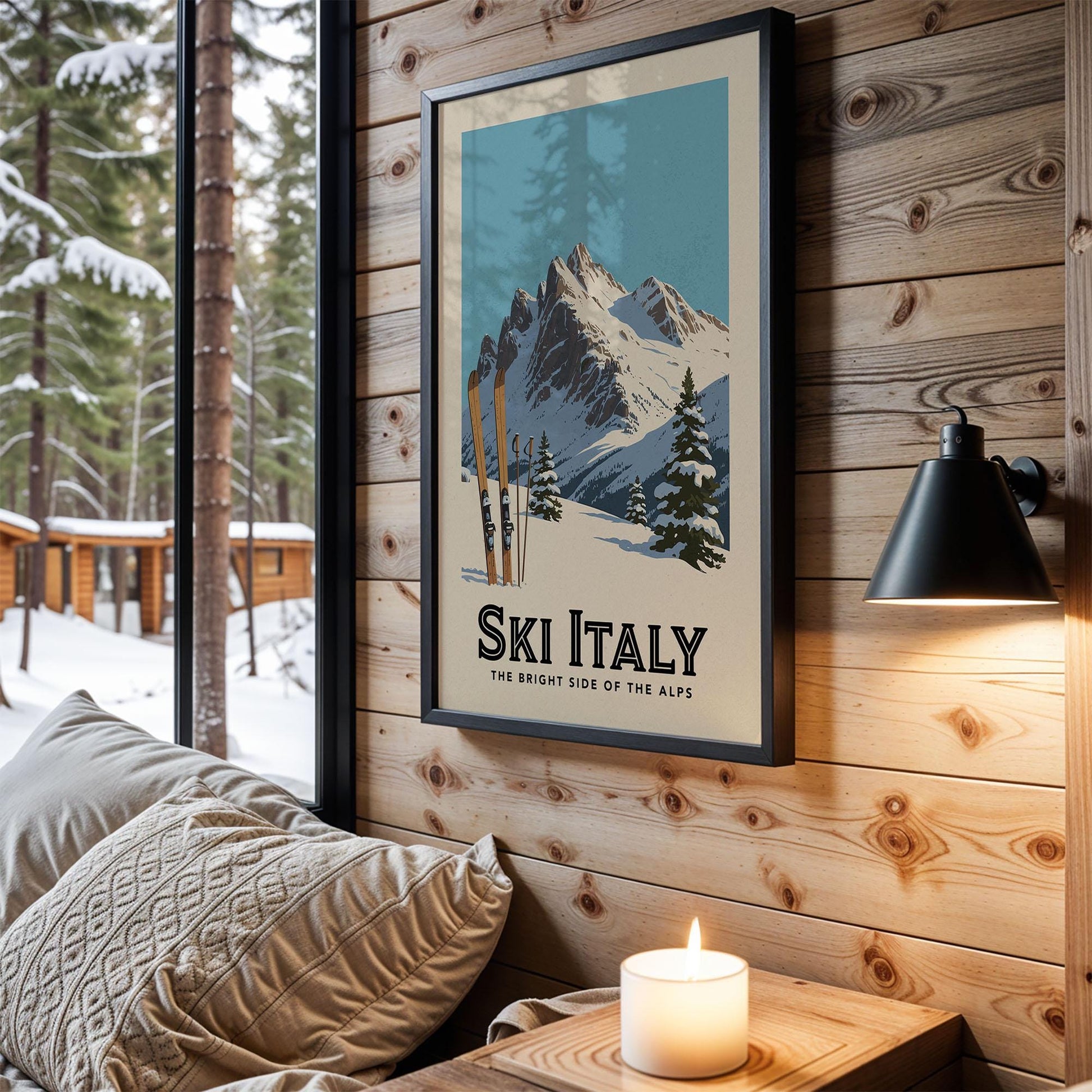 a framed poster of a snowy mountain landscape with ski equipment, hanging on a wooden wall in a cozy cabin setting.