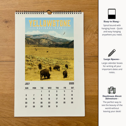 a calendar with a picture of a herd of elephants on it