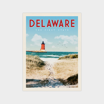 A poster of a lighthouse on a beach with a clear blue sky and ocean in the background.