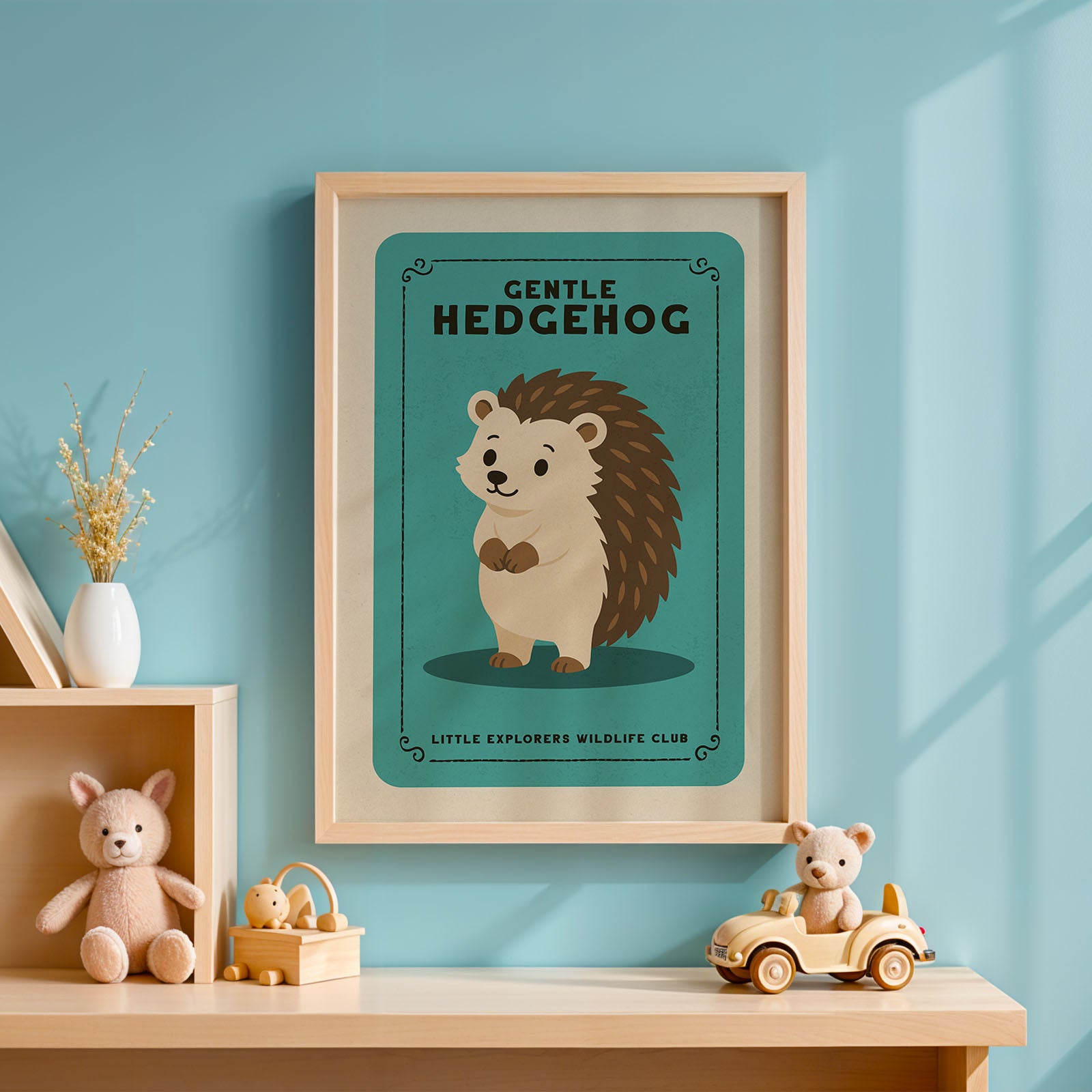 a framed poster of a hedgehog on a blue background, with a wooden shelf below it holding a stuffed animal and a toy car.