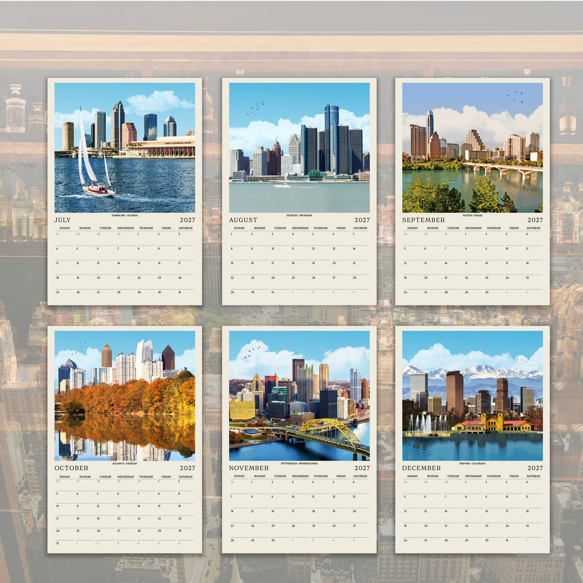 The image is a calendar featuring six different cityscape photographs, each depicting a city skyline at various times of the year.
