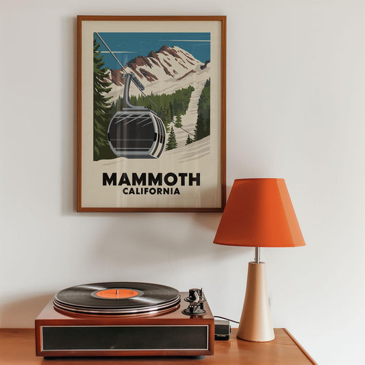 a record player sitting on top of a wooden table