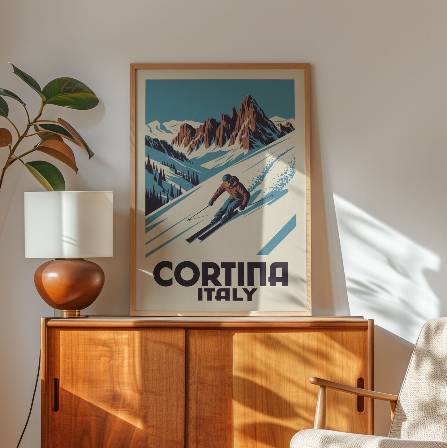 a framed poster of a skier in a mountainous landscape, with the text "Cortina Italy" prominently displayed.