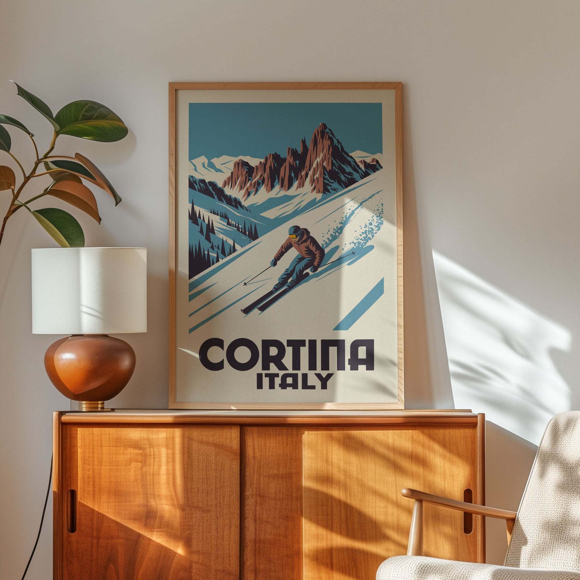 a framed poster of a skier in a mountainous landscape, with the text "Cortina Italy" prominently displayed.