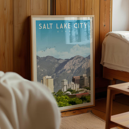 A framed poster of Salt Lake City, Utah, with a mountainous landscape in the background.