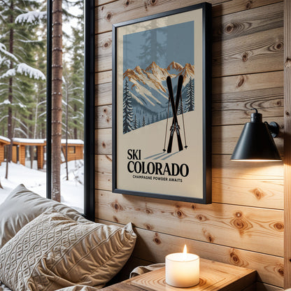 a framed poster of a mountain landscape with skis, hanging on a wooden wall in a cozy cabin setting.