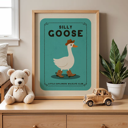 a framed poster of a cartoon goose wearing a cowboy hat, with a teddy bear and a toy truck on a dresser in the foreground.
