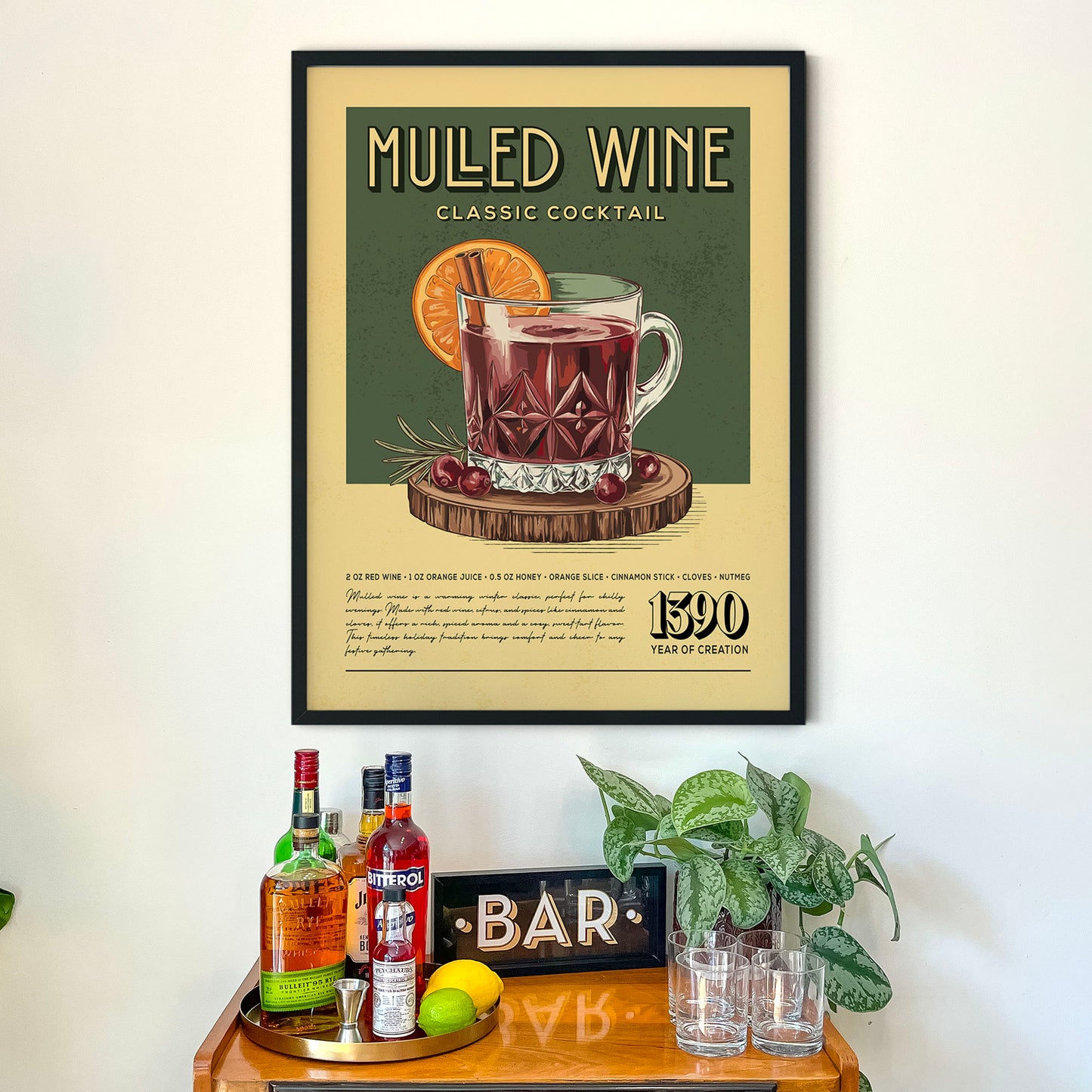 a framed poster of a classic Mulled Wine cocktail, accompanied by a wooden bar display with various liquor bottles and glasses.