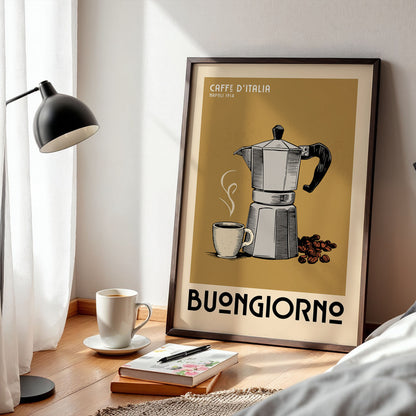 a framed poster of a coffee maker with a cup of coffee and coffee beans, along with the text "Caffè d'Italia" and "Buongiorno". The poster is displayed on a wooden floor, with a lamp, a book, and a cup of coffee nearby.