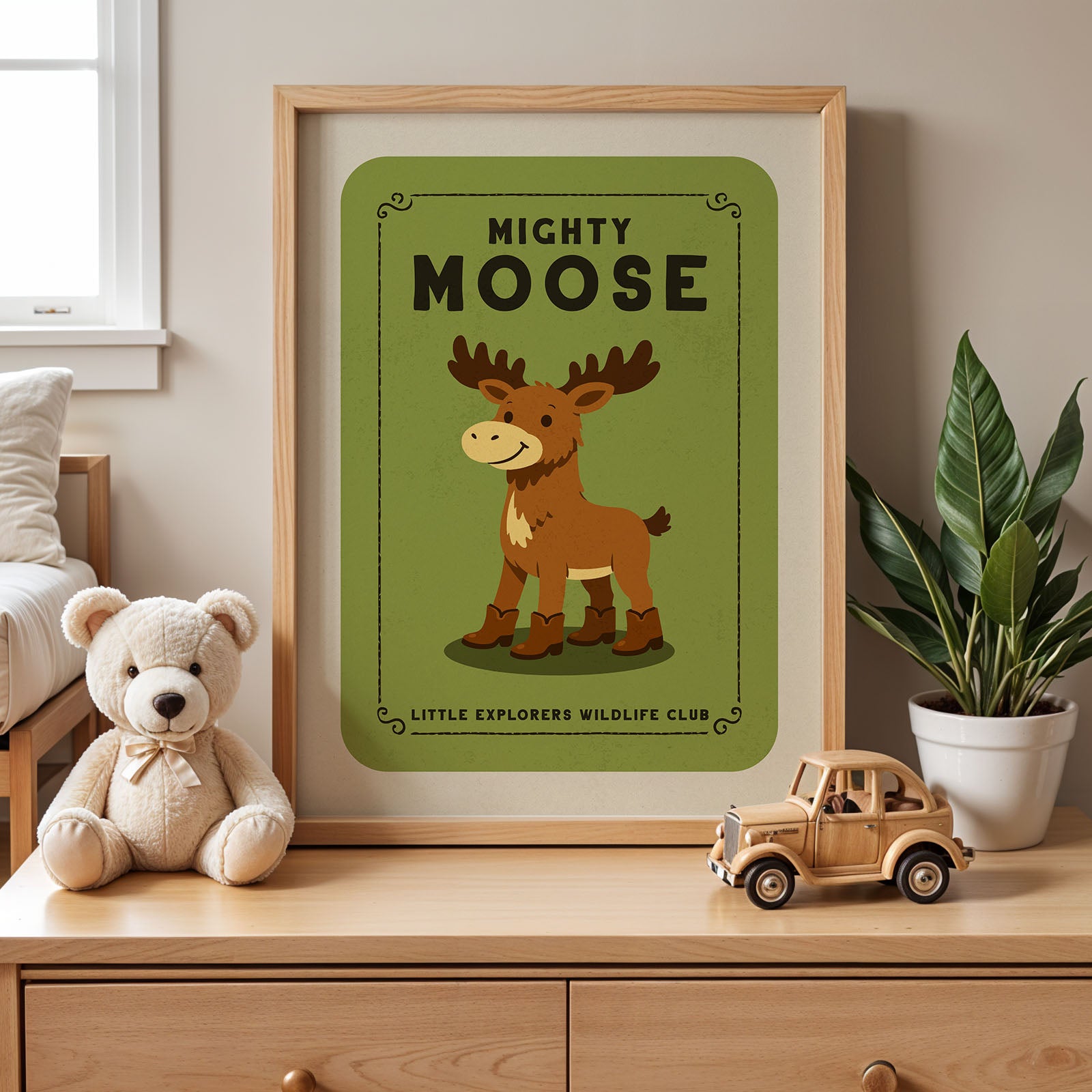 a framed poster of a cartoon moose, a teddy bear, and a toy truck on a wooden dresser.