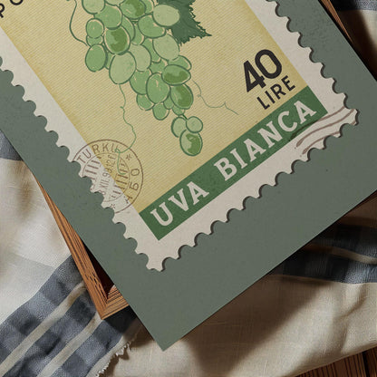 The image is a close-up of a postage stamp featuring a grape vine illustration. The stamp has a value of 40 lire and is from the country of Bianca.