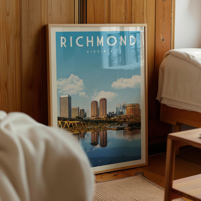 A framed poster of the Richmond, Virginia skyline is displayed in a room with wooden walls.