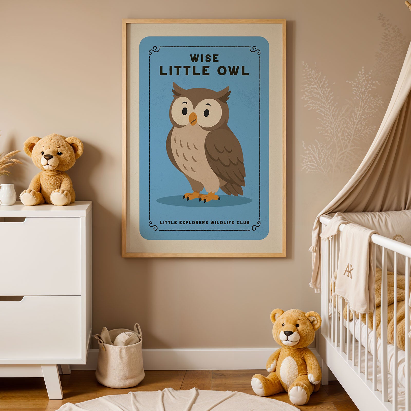 a nursery with a framed poster of an owl, a teddy bear, and a crib.