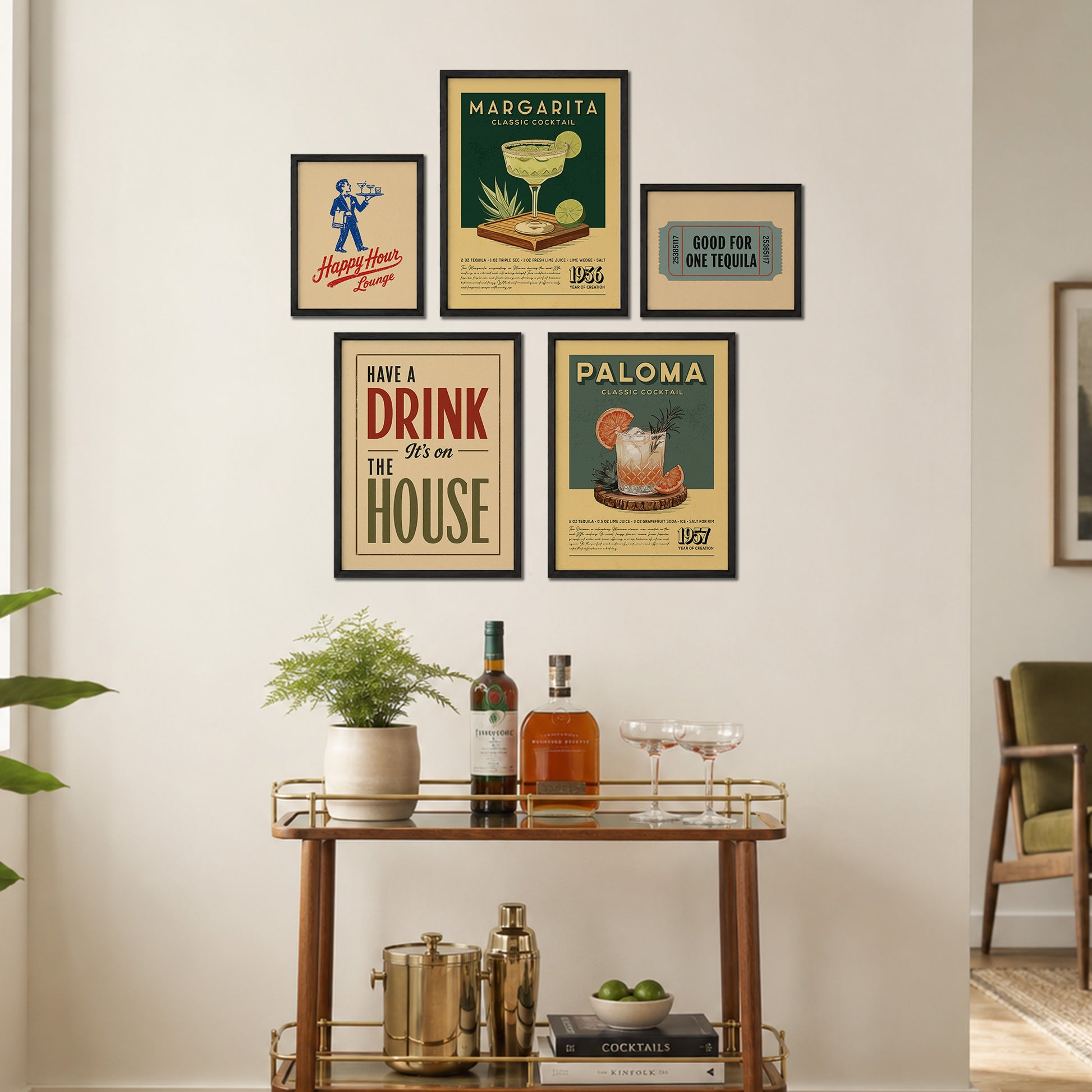 a wall display with framed vintage-style posters and a wooden bar cart with various cocktail ingredients and glassware.