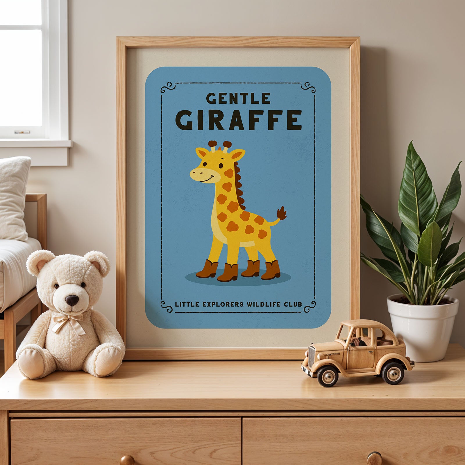 A framed poster of a giraffe is displayed on a wooden dresser, accompanied by a teddy bear and a toy truck.