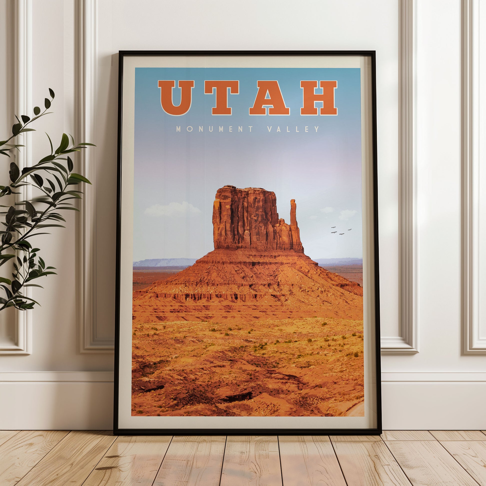 A framed poster of Monument Valley, a famous landmark in Utah, USA.